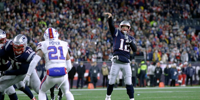 New England Patriots quarterback Tom Brady throws a touchdown pass to tight end Matt LaCosse in the first half of an NFL football game against the Buffalo Bills, Saturday, Dec. 21, 2019, in Foxborough, Mass. (AP Photo/Steven Senne)