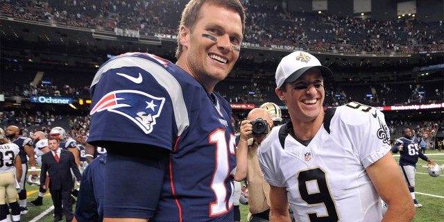 FILE - In this Aug. 22, 2015, file photo, New England Patriots quarterback Tom Brady (12) and New Orleans Saints quarterback Drew Brees (9) greet each other after an NFL preseason football game in New Orleans. (AP Photo/Bill Feig. File)