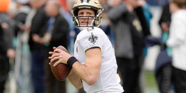 In this Dec. 22, 2019, file photo, New Orleans Saints quarterback Drew Brees warms up for the team's NFL football game against the Tennessee Titans in Nashville, Tenn. (AP Photo/Mark Zaleski, File)