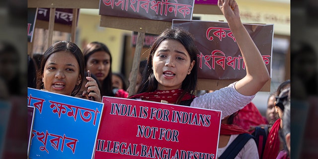 Indian students protest against the Citizenship Amendment Bill (CAB) in Gauhati, India, Monday, Dec. 9, 2019. (AP Photo/Anupam Nath)
