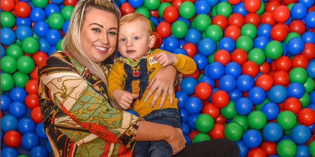 Joanne Grimshaw (L) and her son Ellis. (Caters News Agency)