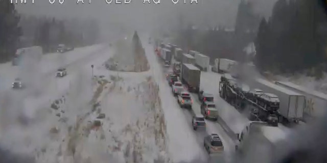 In this still image taken from a Caltrans remote video traffic camera last week, traffic is stopped along Interstate 80 because of multiple spinouts due to a winter storm that impacted the area during the busy Thanksgiving travel period.