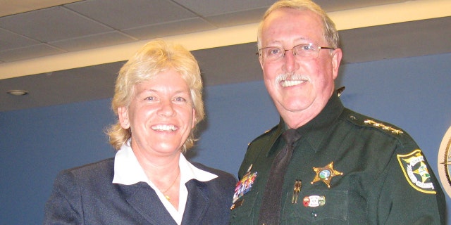 Capt. Penny Phelps, left, in a photo from 2012.