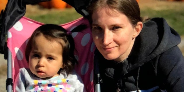 Vanessa Morales, 1, and her mother, Christien Holloway, 43. Cops searched for the baby Friday. Holloway was found murdered Monday in her home.