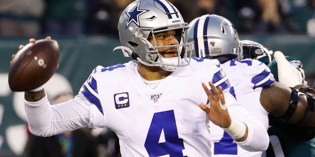 Dallas Cowboys quarterback Dak Prescott throws a pass during the first half of an NFL football game against the Philadelphia Eagles Sunday, Dec. 22, 2019, in Philadelphia. (AP Photo/Chris Szagola)