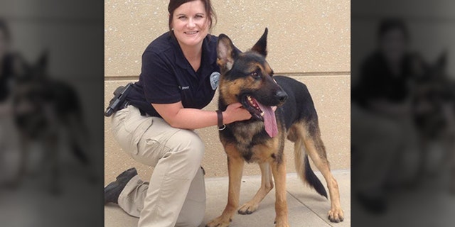 The Sedgwick County Sheriff's Office posted this photo of Deputy Sarah Sinnett and her new police dog Nimitz on Facebook in 2014.