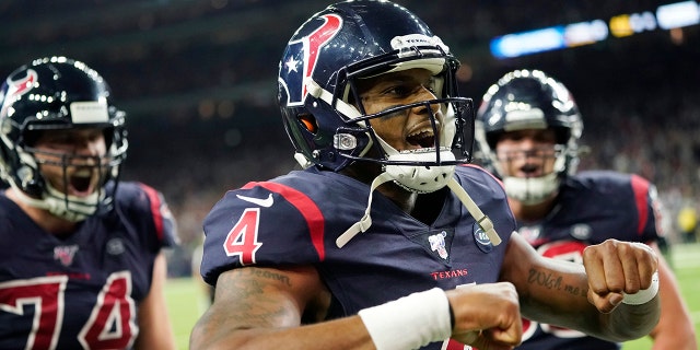 Houston Texans quarterback Deshaun Watson (4) celebrates after he scored a touchdown against the New England Patriots during the second half of an NFL football game Sunday, Dec. 1, 2019, in Houston. (AP Photo/David J. Phillip)
