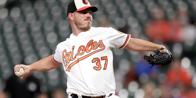 The Los Angeles Angels have acquired right-hander Dylan Bundy from the Baltimore Orioles in a trade for four minor league pitchers. The 27-year-old Bundy has been a solid starter with a nasty slider for the past four seasons with the Orioles. He will be a key rotation member in Los Angeles as the Angels look to improve one of the majors' worst rotations. (AP Photo/Julio Cortez, File)