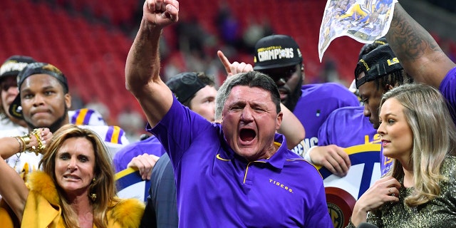 LSU head coach Ed Orgeron celebrates after the Southeastern Conference championship game against Georgia, Saturday, Dec. 7, 2019, in Atlanta.