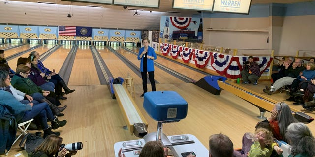 Democratic presidential candidate Sen. Elizabeth Warren of Massachusetts holds a town hall at a bowling alley in Peterborough, N.H., on Dec. 6, 2019