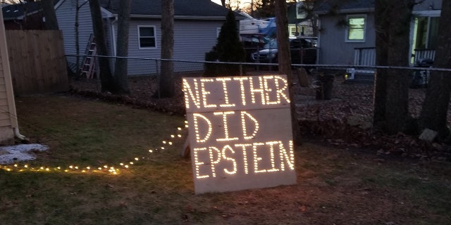 Gibson based his display off of the popular "Epstein didn't kill himself" meme.