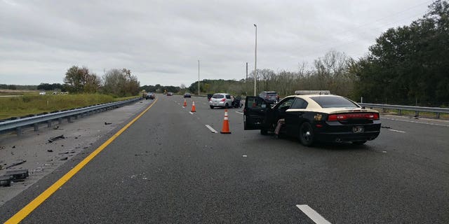 US News Investigators are looking for the white sedan that hit the 2011 Nissan and left the scene.