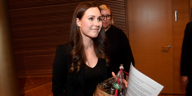 The candidate for the next Prime Minister of Finland, Sanna Marin, smiles after she won the SDP's Prime Minister candidate vote against Antti Lindtman, in Helsinki, Finland, Sunday, Dec. 8, 2019.