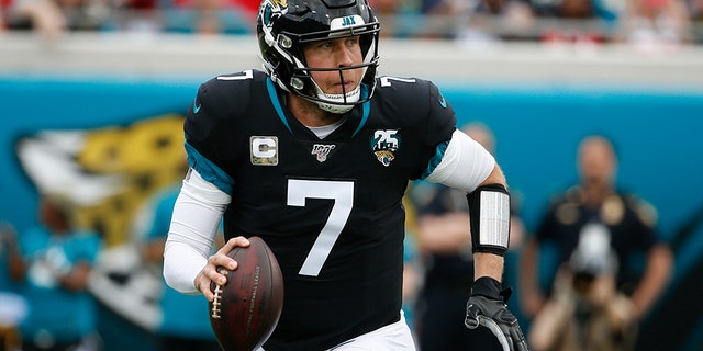Jacksonville Jaguars quarterback Nick Foles (7) looks for a receiver against the Tampa Bay Buccaneers during the first half of an NFL football game, Sunday, Dec. 1, 2019, in Jacksonville, Fla. (AP Photo/Stephen B. Morton)