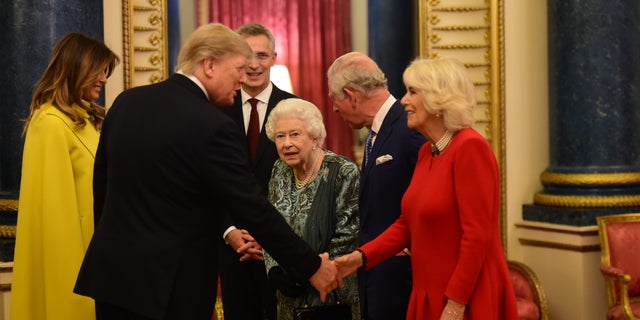 Queen Elizabeth II, Prince Charles and Duchess Camilla welcome Donald and Melania Trump to Buckingham Palace. Her Majesty Queen Elizabeth II hosted the reception for NATO Leaders to mark 70 years of the NATO Alliance. (Photo by Geoff Pugh - WPA Pool/Getty Images)