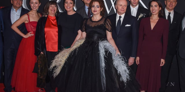 "The Crown" director Ava DuVernay said she'd like to depict Harry and Meghan's swift exit on an upcoming episode. Here, the cast celebrates the world premiere of the Netflix series' third season in November.
