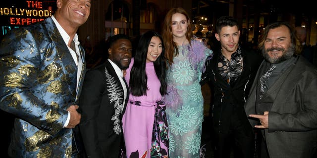 (L-R) Dwayne Johnson, Kevin Hart, Awkwafina, Karen Gillan, Nick Jonas and Jack Black at the