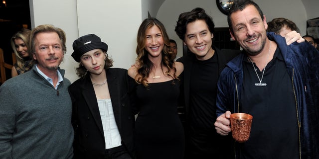 Left to right: David Spade, King Princess, Jackie Sandler, Cole Sprouse and Adam Sandler at the premiere of "Uncut Gems." (Photo by Joshua Blanchard/Getty Images for A24)