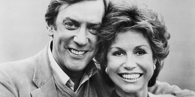 Donald Sutherland and Mary Tyler Moore are shown in a scene from their movie, "Ordinary People" directed by Robert Redford and released by Paramount Pictures. Sutherland and Moore's characters attempt to pick up the pieces of their shattered life after a major tragedy by planning a holiday trip to London.