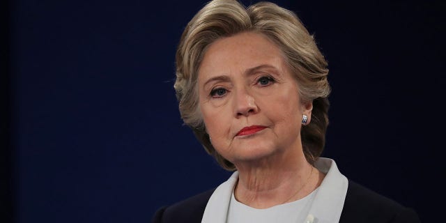 Democratic presidential nominee former Secretary of State Hillary Clinton listens to a question during the town hall debate at Washington University on October 9, 2016 in St Louis, Missouri. (Photo by Chip Somodevilla/Getty Images)