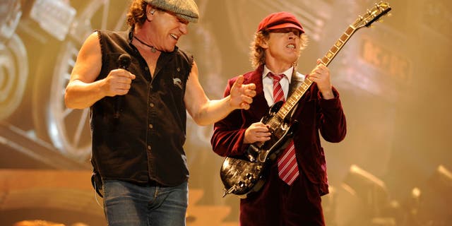 Brian Johnson and Angus Young of AC/DC perform during their "Black Ice" Tour Opener on October 28, 2008. (Kevin Mazur/Getty Images)