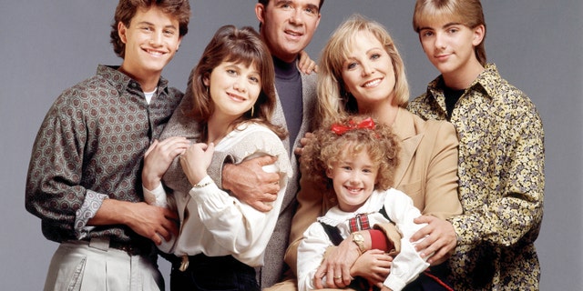 CIRCA 1990: GROWING PAINS - cast gallery - Season Five - 1/1/90, Kirk Cameron (Mike), Tracey Gold (Carol), Alan Thicke (Jason), Ashley Johnson (Chrissy), Joanna Kerns (Maggie), Jeremy Miller (Ben), (Photo by Walt Disney Television via Getty Images Photo Archives/Walt Disney Television via Getty Images)