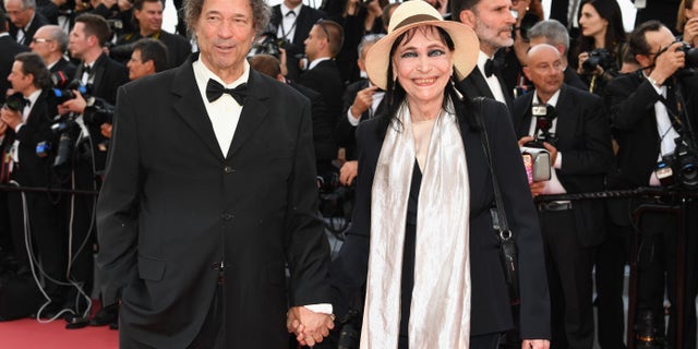 Maurice Cooks and Anna Karina attend the 71st annual Cannes Film Festival at Palais des Festivals in 2018. (Photo by Pascal Le Segretain/Getty Images)