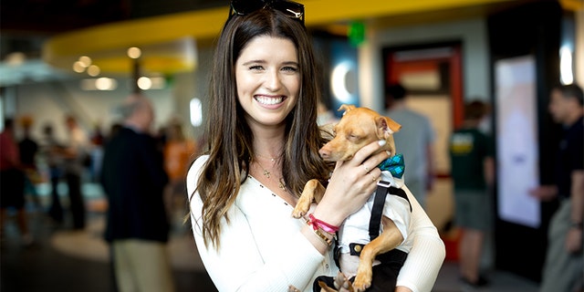 Author Katherine Schwarzenegger poses for a picture with dog Tuna at the Grand Opening Celebration For The Wallis Annenberg PetSpace at the Wallis Annenberg PetSpace on June 24, 2017, in Playa Vista, California.