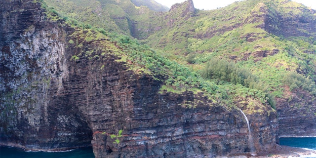 This photo provided by the Hawaii Department of Land and Natural Resources shows an area over Napali Coast State Wilderness Park where search and rescue searched for a tour helicopter that disappeared.