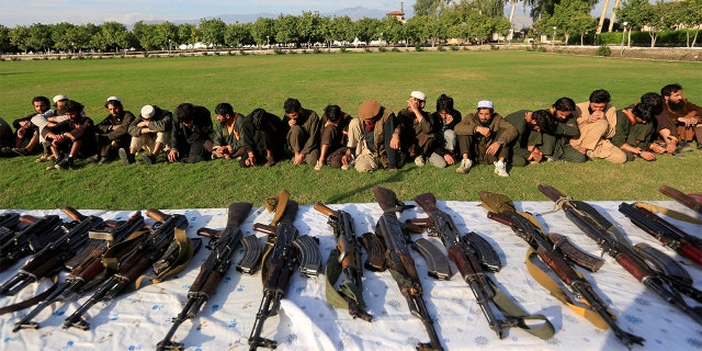 Islamic State militants who surrendered to the Afghan government are presented to media in Jalalabad, Nangarhar province, Afghanistan November 17, 2019. A Connecticut man is charged with attempting to travel to Syria to kill on behalf of the terror group. REUTERS/Parwiz