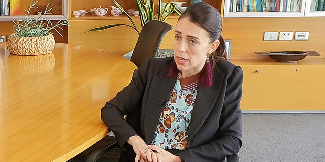 New Zealand's Prime Minister Jacinda Ardern speaks during an interview in Wellington, New Zealand, Thursday, Dec. 5, 2019. Ardern said she’ll do all she can to stop a man accused of killing 51 Muslim worshippers from spreading his message of hate at his trial. She also hopes artificial intelligence will one day stop such attacks from being broadcast online. (AP Photo/Sam James)