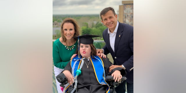 John Crowley, his wife and daughter Megan Crowley.