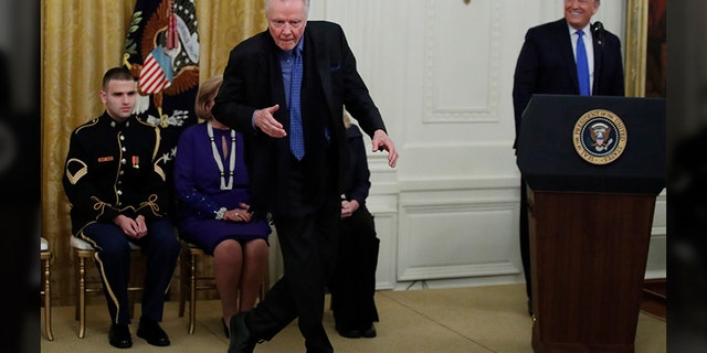 Jon Voight dances as President Donald Trump looks on during a National Medal of Arts and National Humanities Medal ceremony in the East Room of the White House, Thursday, Nov. 21, 2019, in Washington. (AP Photo/Alex Brandon)