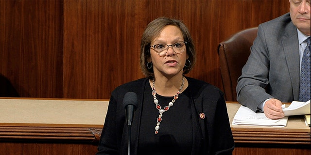 Rep. Robin Kelly, D-Ill., speaks as the House of Representatives debates the articles of impeachment against President Donald Trump at the Capitol in Washington, Wednesday, Dec. 18, 2019. (House Television via AP)