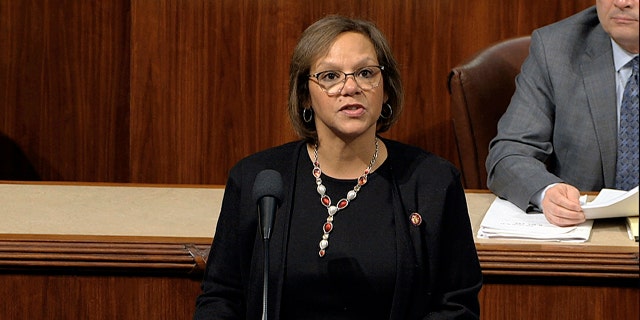 Rep. Robin Kelly, D-Ill., speaks as the House of Representatives debates the articles of impeachment against President Donald Trump at the Capitol in Washington, Wednesday, Dec. 18, 2019. (House Television via AP)