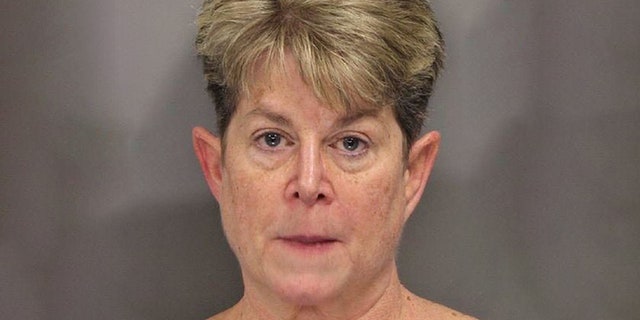 Kelly Lewis, 56, allegedly let a 5-year-old child sit in his own waste for hours to "prove a point," police said.