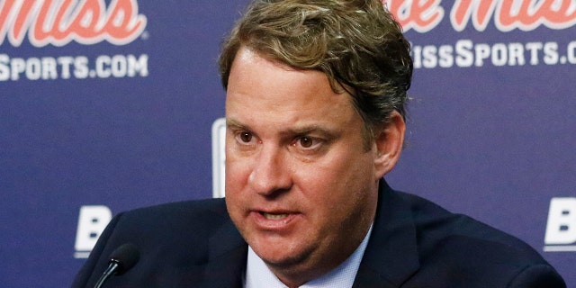 Lane Kiffin responds to reporters questions at a news conference, after being introduced to Mississippi fans as their new NCAA college football coach, at The Pavilion, a multipurpose arena on the campus in Oxford, Miss., Monday, Dec. 9, 2019. Kiffin was previously, the football coach for three years at Florida Atlantic. (AP Photo/Rogelio V. Solis)