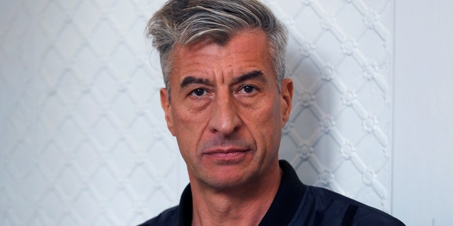 Italian artist Maurizio Cattelan created the banana duct-taped to a wall art piece that sold for $120,000. (Reuters, File)