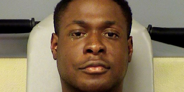 Mugshot for Michael Egwuagu, 25. The former University of Texas at San Antonio football player has been arrested and charged in the fatal stabbing of his sister at a home north of Austin. (Travis County Sheriff's Office via AP)