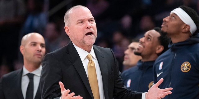 Denver Nuggets coach Michael Malone reacts during the first half of the team's NBA basketball game against the New York Knicks, Thursday, Dec. 5, 2019, at Madison Square Garden in New York. 