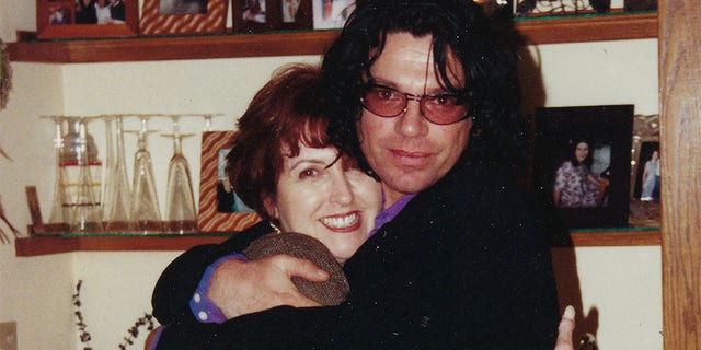 Michael Hutchence with his sister Tina celebrating Thanksgiving, circa 1996.