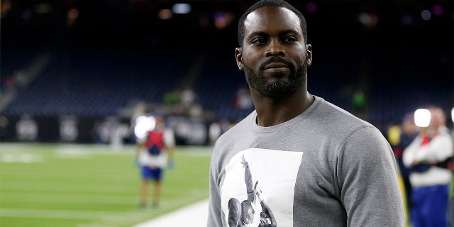 HOUSTON, TEXAS - DECEMBER 01: Former quarterback Michael Vick looks on prior to the game between the New England Patriots and the Houston Texans at NRG Stadium on December 01, 2019 in Houston, Texas. (Photo by Bob Levey/Getty Images)