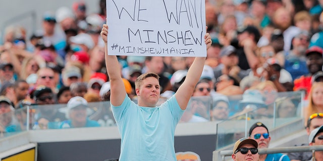 A Jacksonville Jaguars fan holding a sign about Gardner Minshew during the first quarter of a game at TIAA Bank Field on Dec. 1. (Photo by James Gilbert/Getty Images)