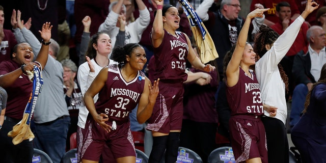 FILE - In this Monday, March 25, 2019, file photo, Missouri State forward Jasmine Franklin, left, guard Sydney Wilson, center, and guard Mya Bhinhar, right, celebrate a 3-point basket by guard Sydney Manning during the second half against Iowa State in the second round of the NCAA women's college basketball tournament, in Ames, Iowa. In the first week of December 2019, Missouri State is ranked for the first time in 15 years. Franklin, Wilson and Bhinhar are returning players from a squad that reached last season's Sweet 16. (AP Photo/Matthew Putney, File)