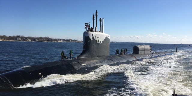 The Virginia-class, nuclear-powered, fast-attack submarine, USS North Dakota (SSN 784), transits the Thames River as it pulls into its homeport on Naval Submarine Base New London in Groton, Conn - file photo.