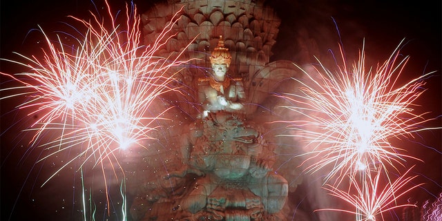 Fireworks explode over Garuda Wisnu Kencana statue during New Year's celebrations in Bali, Indonesia, Jan. 1, 2020. (Reuters)