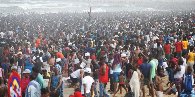 Revellers enjoy New Year's Day on a beach in Durban, South Africa January 1, 2017. (Reuters) 