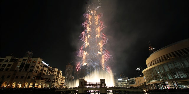 Fireworks explode around the Burj Khalifa, the tallest building in the world, during New Year celebrations in Dubai, United Arab Emirates, Jan. 1, 2020. (Reuters) 