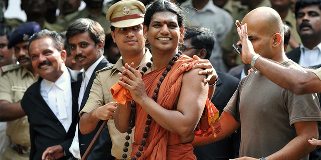 Controversial Hindu Godman Swami Nityananda is wanted in India for a series of assault and sexual abuse charges (AFP / Manjunath Kiran)