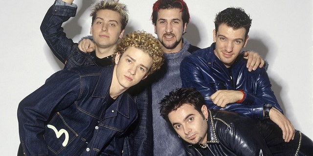 He's the one with the ramen-noodle hair.